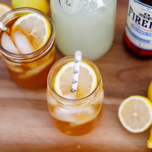 Cocktail glasses, lemonade pitcher, lemons